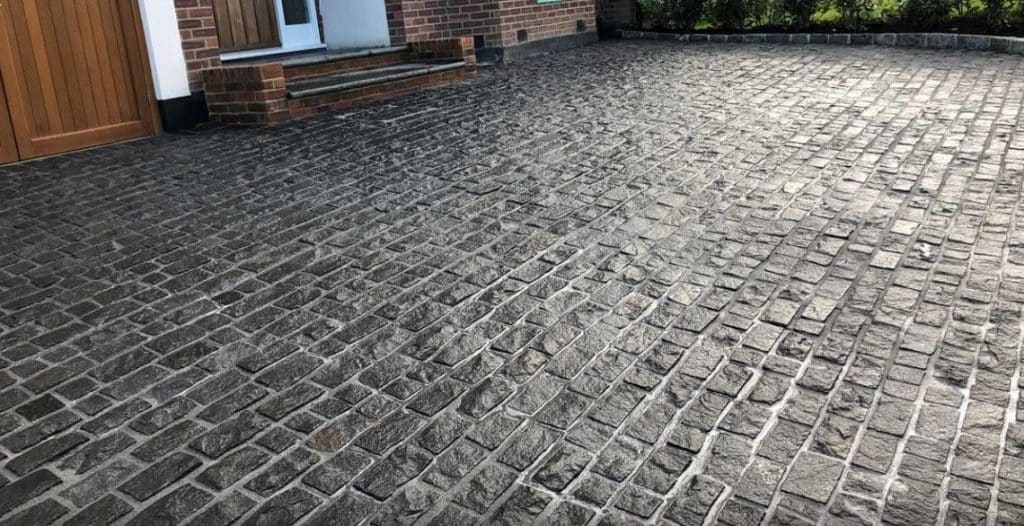 Cobble Granite New Black - Clay, Concrete, Porcelain, & Stone Pavers